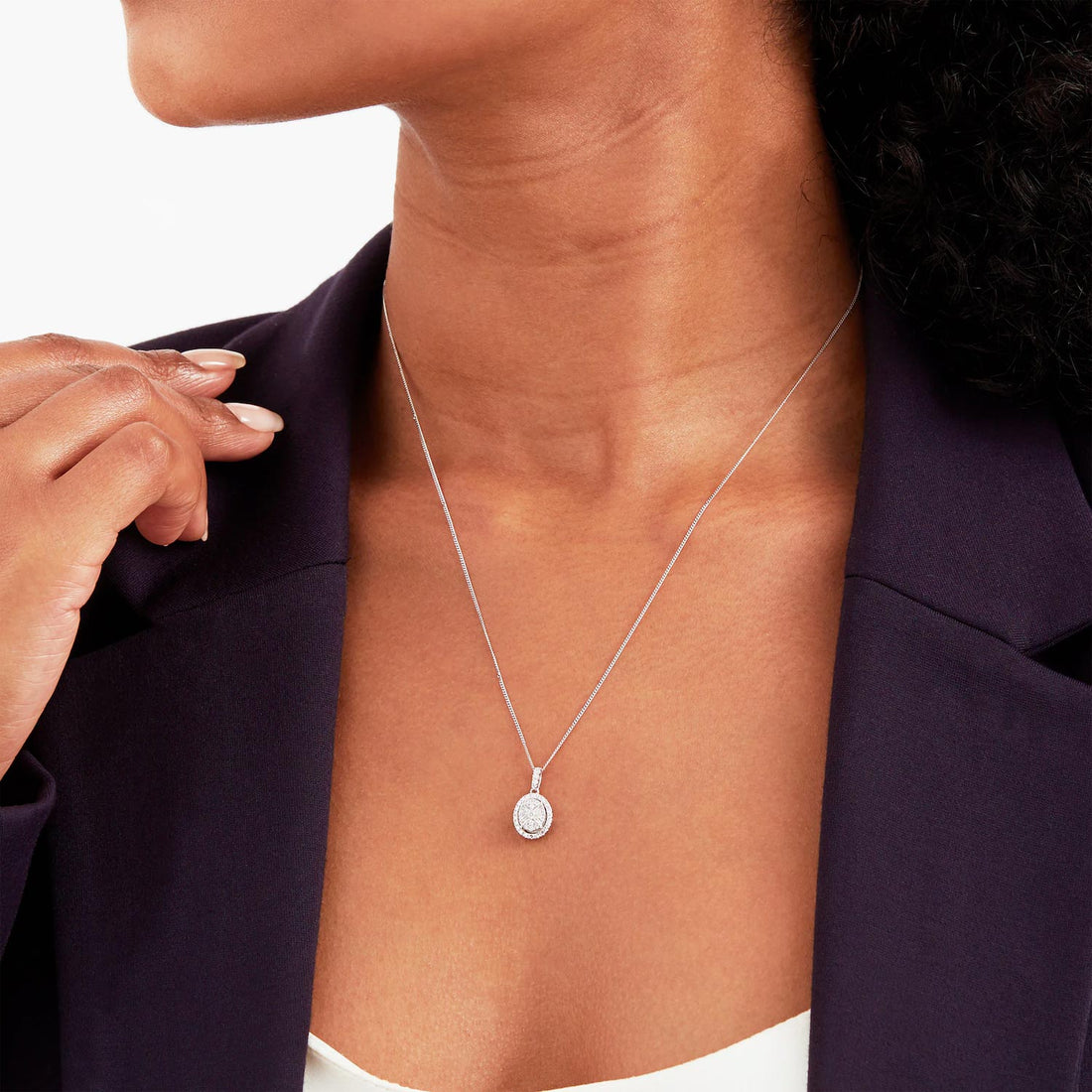 9ct White Gold 0.25ct Diamond Oval Cluster Pendant