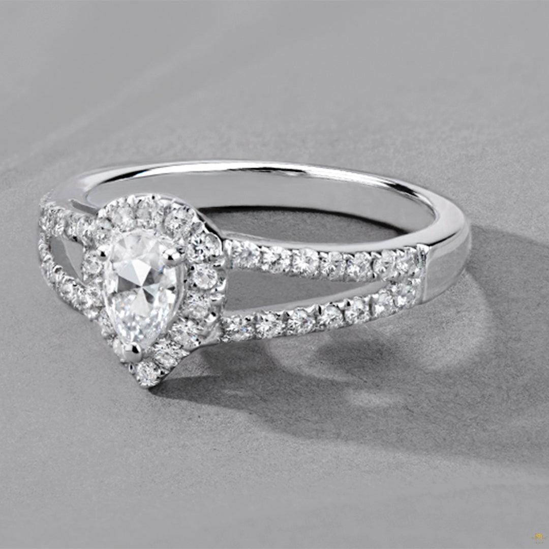 0.96 CTW   Pear Near-Colorless Moissanite Accented Split Shank Halo Engagement Ring in 14K White Gold