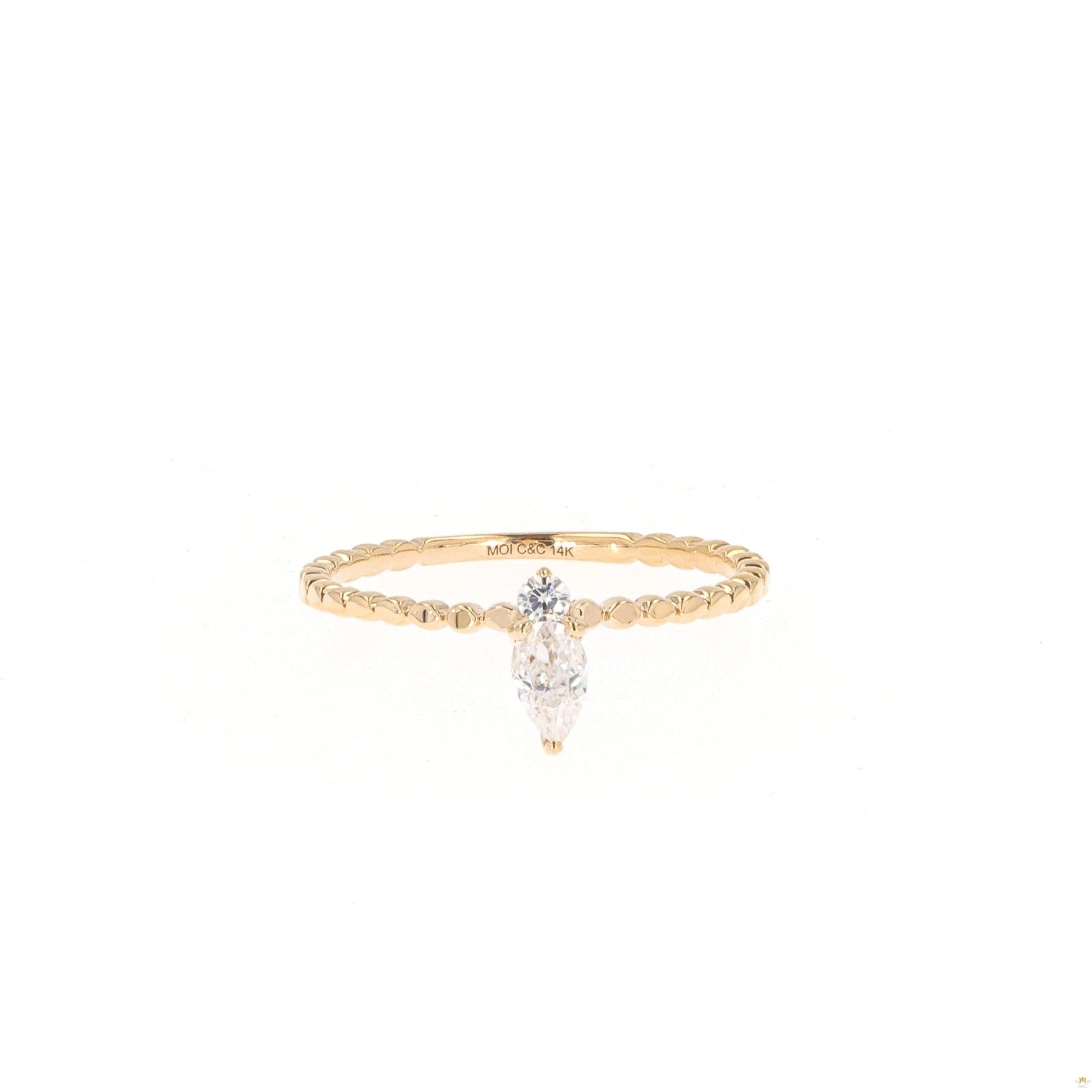 0.24 CTW   Pear Near-Colorless Moissanite Stackable Band in 14K Yellow Gold