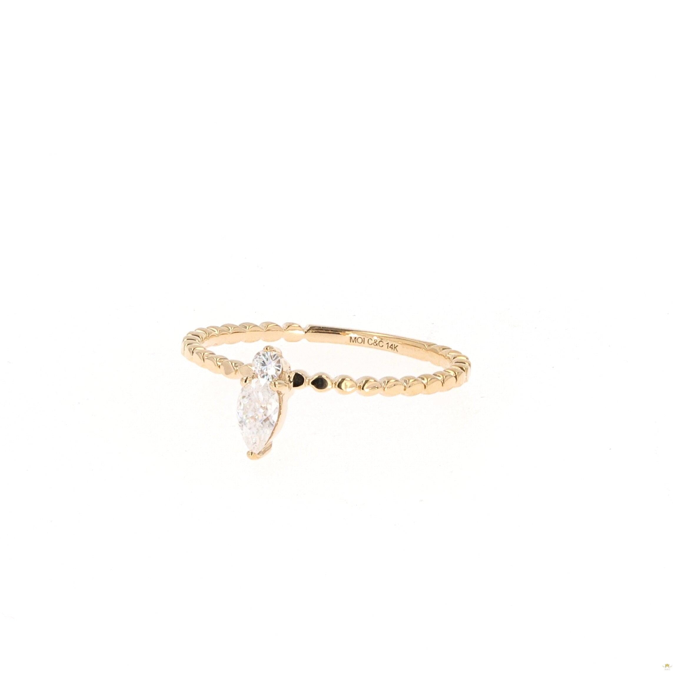 0.24 CTW   Pear Near-Colorless Moissanite Stackable Band in 14K Yellow Gold